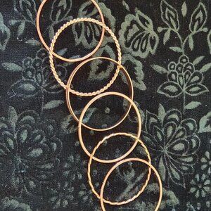 SIX BANGLE BRACELETS